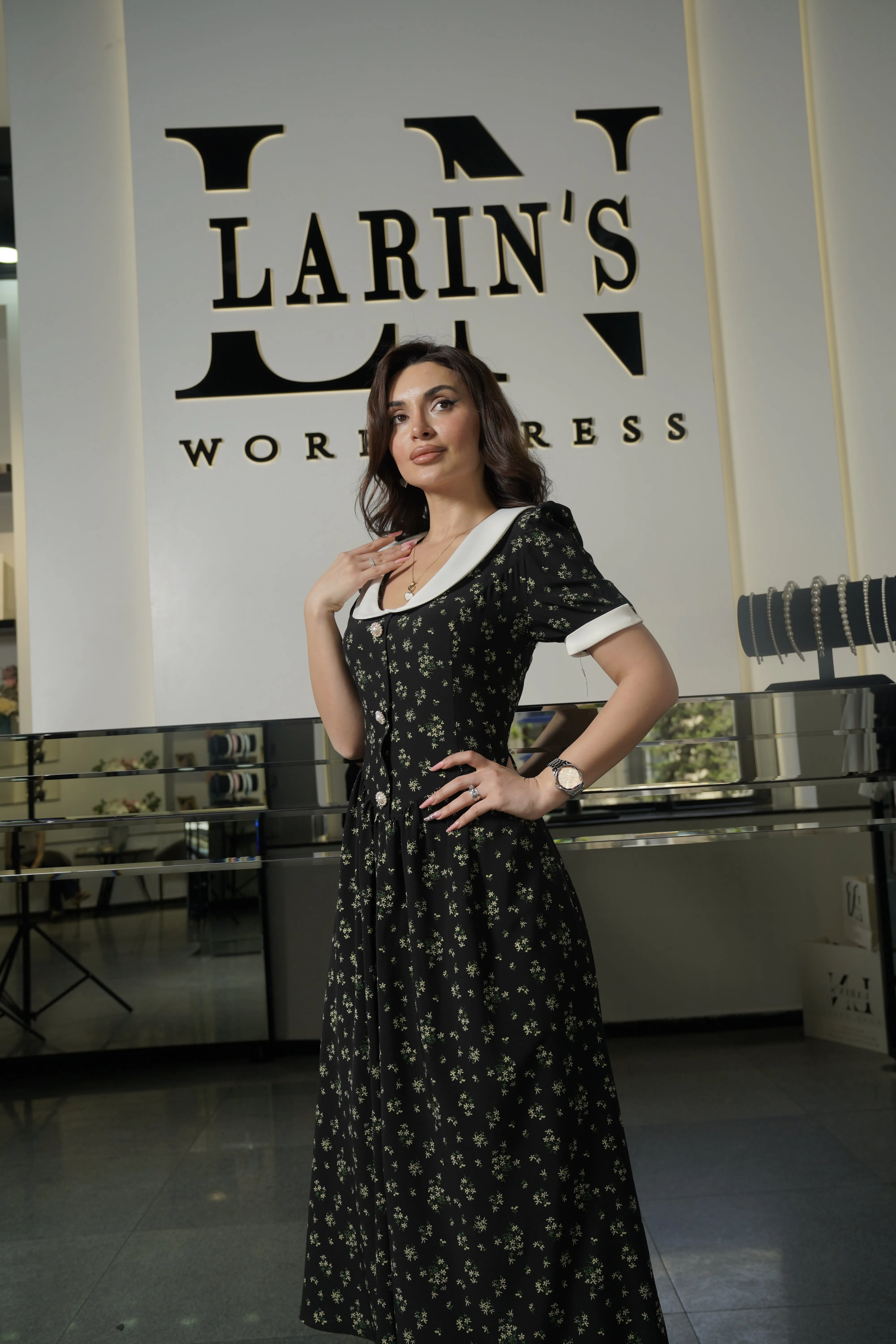 Elegant Black Floral Dress with White Collar and Cuffs
