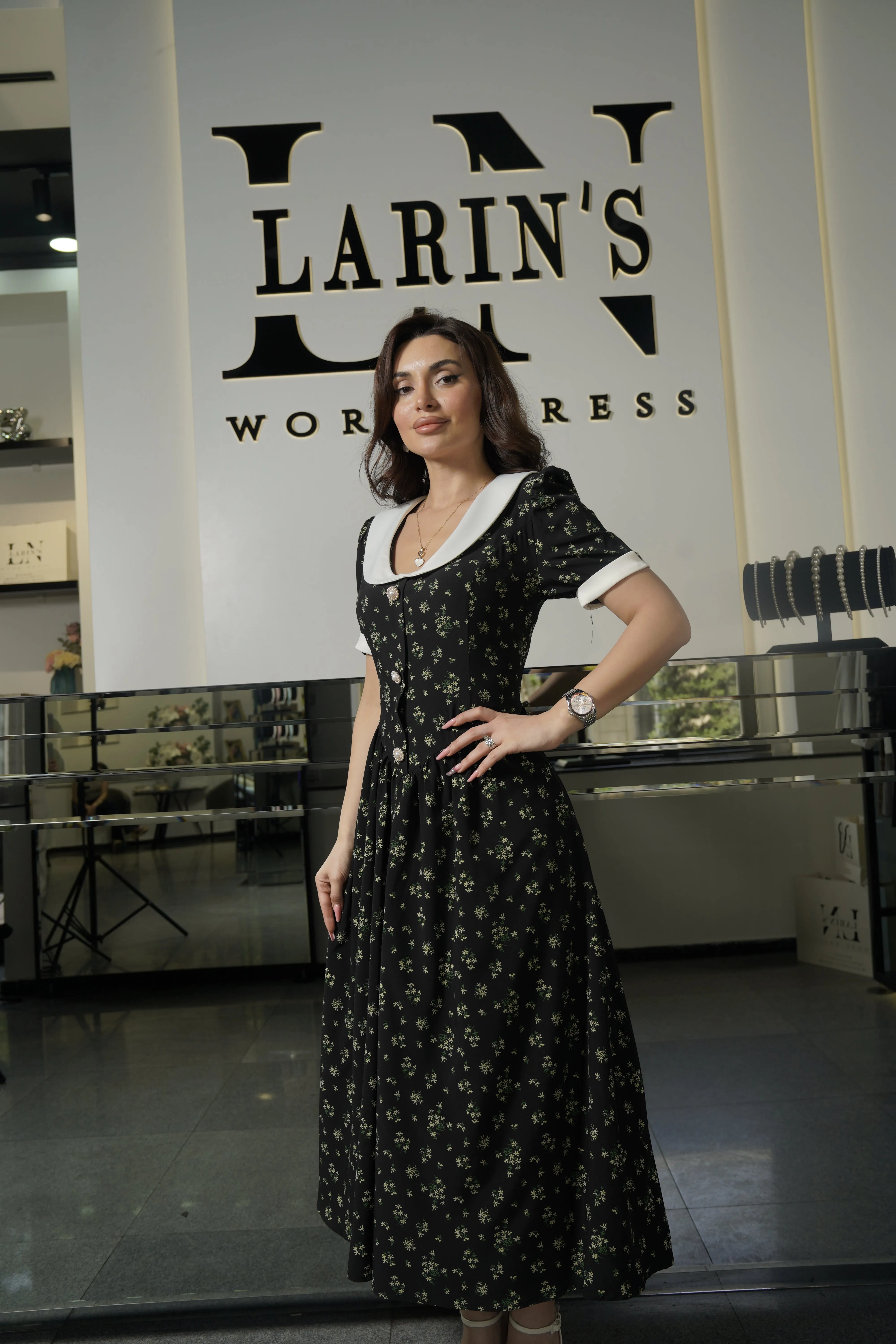 Elegant Black Floral Dress with White Collar and Cuffs