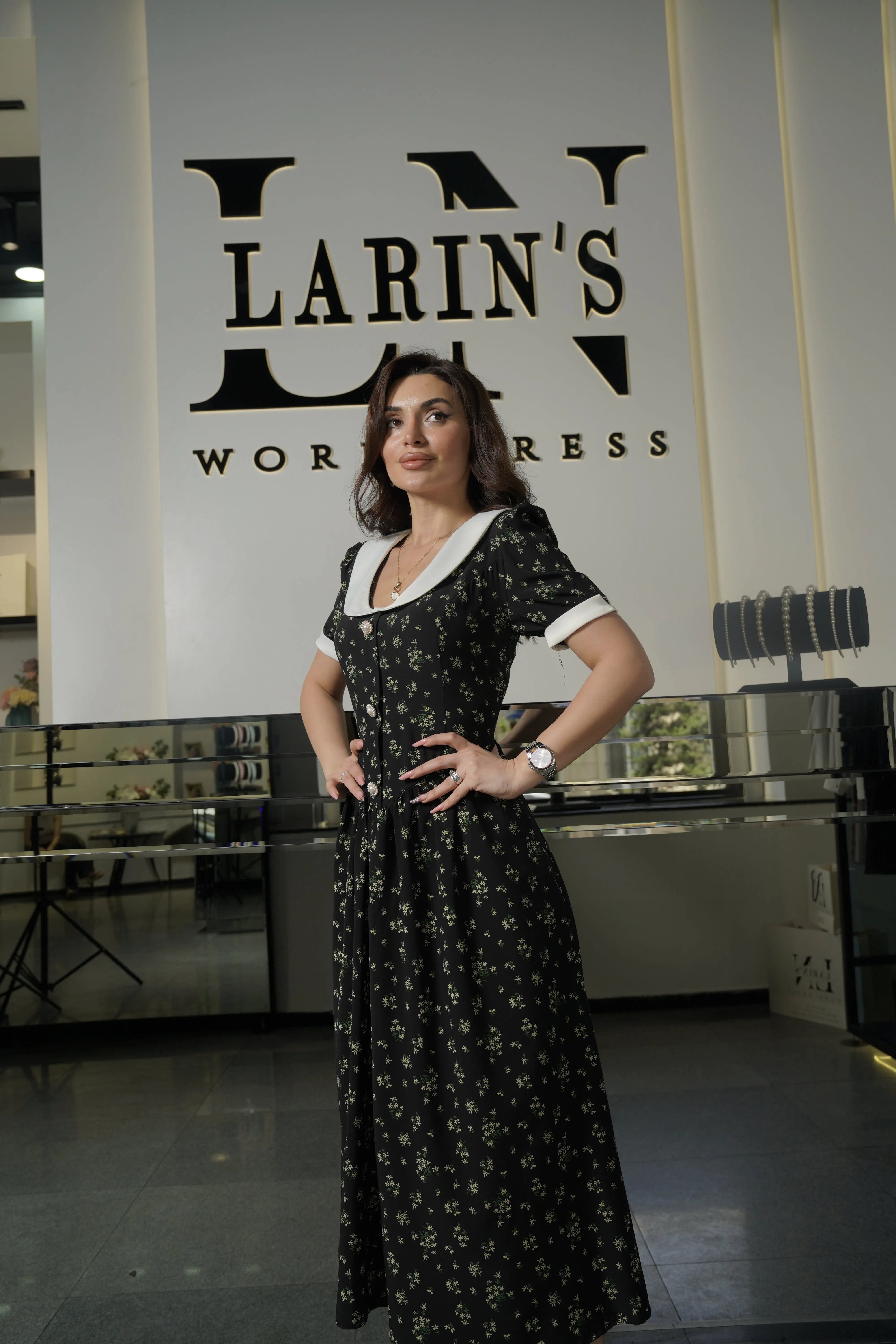 Elegant Black Floral Dress with White Collar and Cuffs