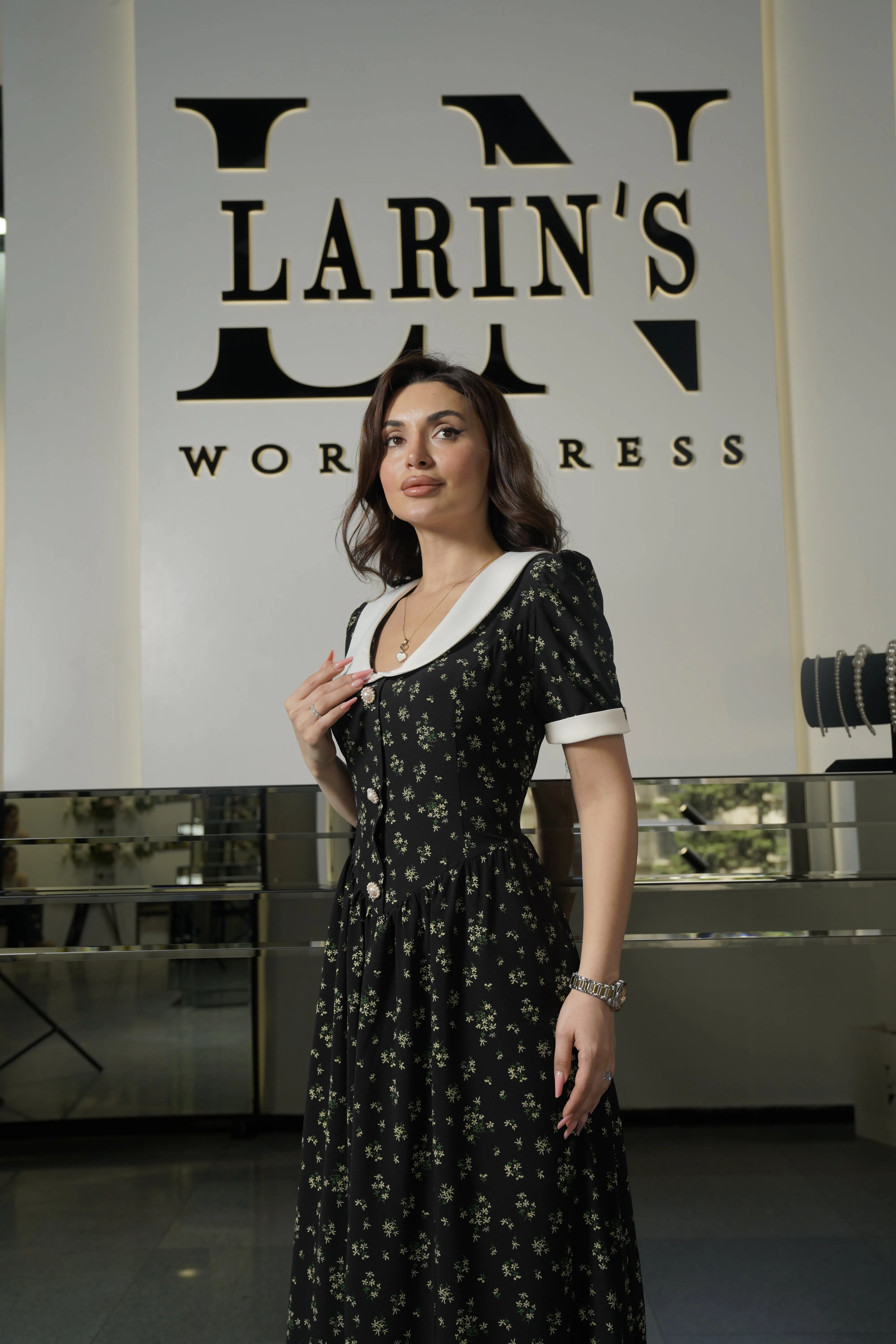 Elegant Black Floral Dress with White Collar and Cuffs